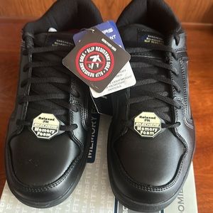 Brand new Skechers work slip resistant never worn shoes. Black 7.5 men’s
